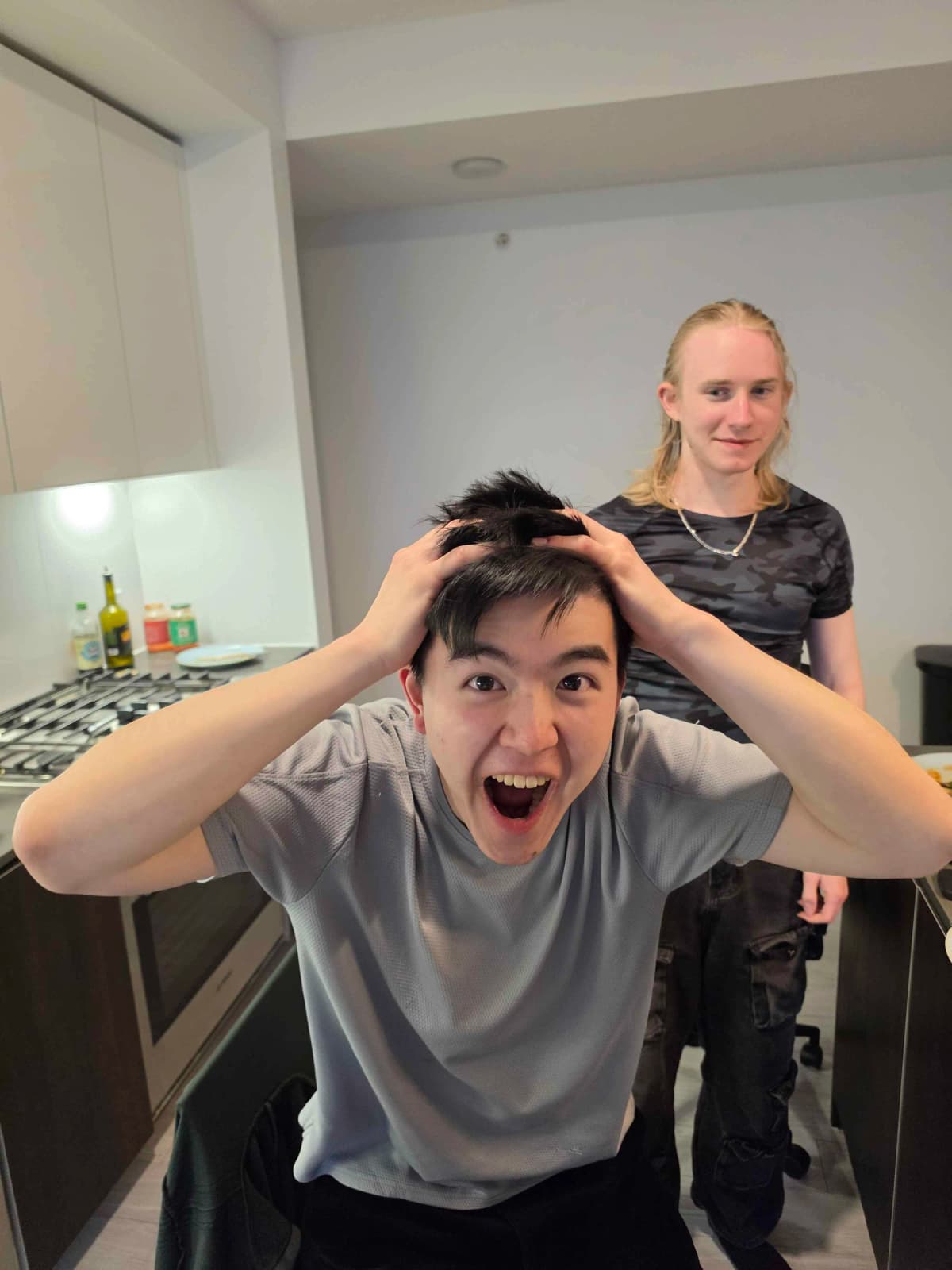 bill has a moment in the kitchen